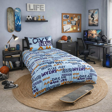 Kids bedroom with a light blue duvet cover set with creatively written words on it.
