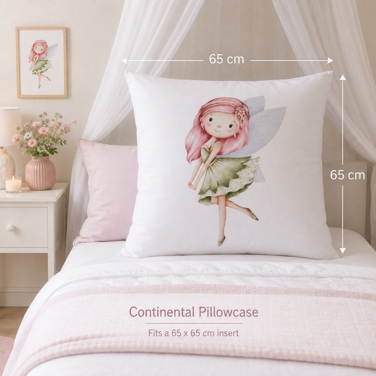 A white continental pillowcase featuring a watercolor illustration of a fairy with pink hair and a green dress, displayed on a bed with dimension markers indicating a 65 cm by 65 cm size.