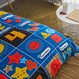 Close up of colorful numbers and shapes pattern on kids maths duvet cover set