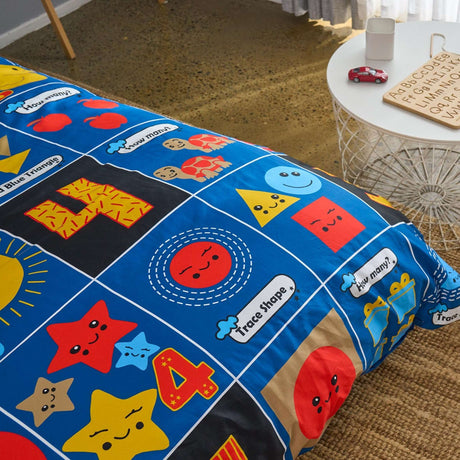 Close up of colorful numbers and shapes pattern on kids maths duvet cover set