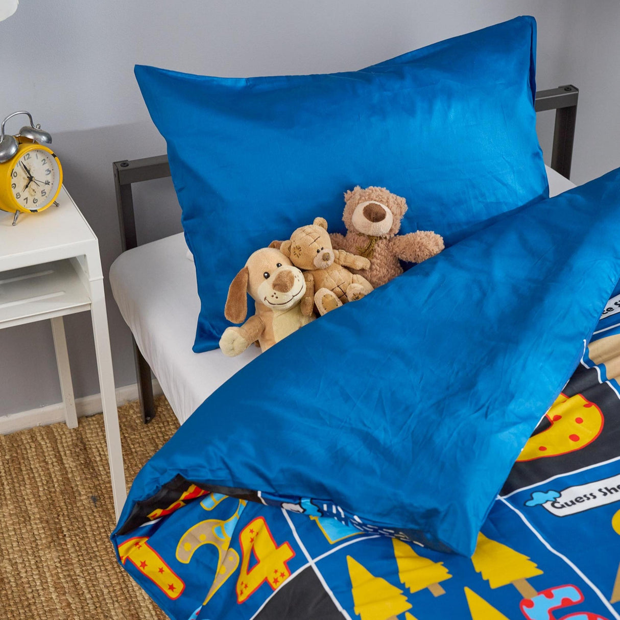 Reversible maths kids duvet set showing solid royal blue reverse side