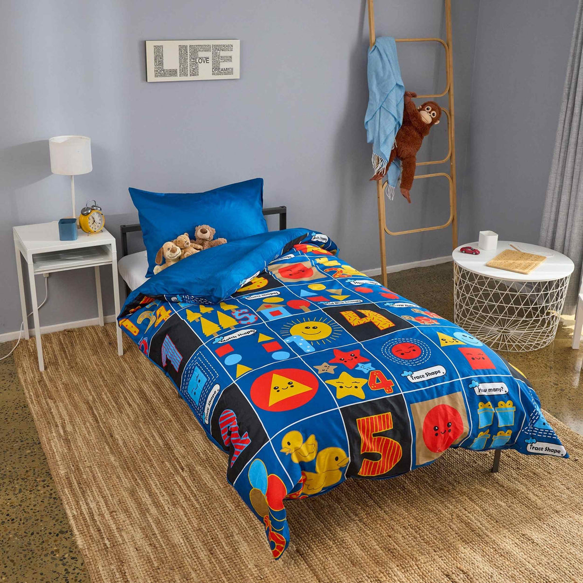 Bright educational kids bedroom setup with maths organic cotton bedding
