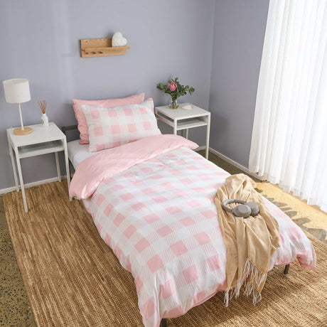 rose quartz gingham check pink and white bamboo duvet cover styled on kids bed setup