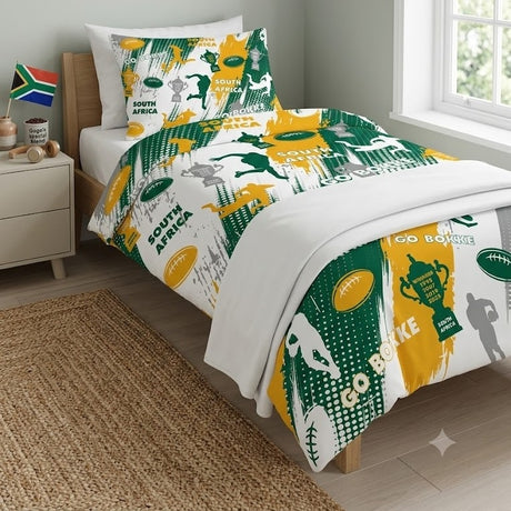 A South Africa rugby team themed bedding set, including a duvet cover and pillowcase, styled on a single bed in a bedroom setting with a window, bedside table, and rug.