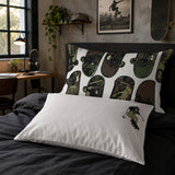 Teenage bedroom with a pillowcase with a camo coloured skateboards pattern and another pillow on the bed with a white pillowcase with a skateboarder in the right hand side upper corner.