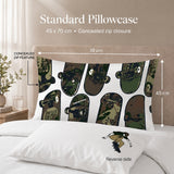 A standard skateboarding themed pillowcase shown on a bed in a bedroom setting, with overlaid dimension labels indicating 70 cm by 45 cm. The pillowcase features a repeating skateboard print in camouflage and olive tones on a white base.