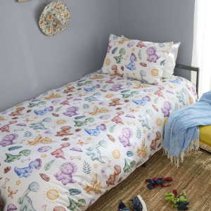Dinosaur designs on duvet cover and pillowcase on a bed in a child's bedroom